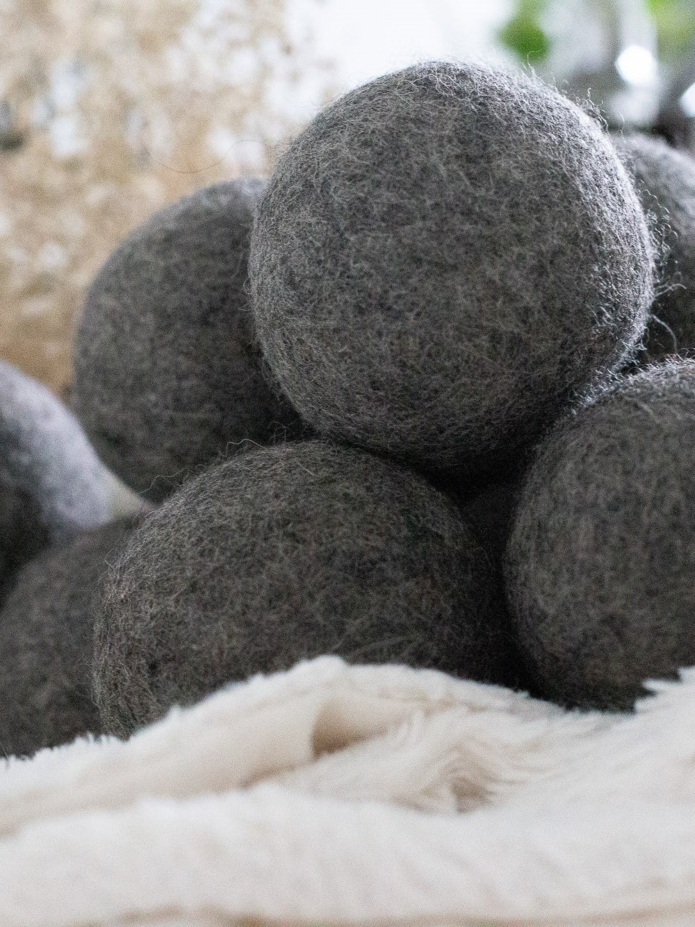 Balles de séchage en laine naturelle d'UpSimply pour une utilisation écologique.