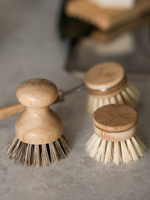 Trio of wooden brushes